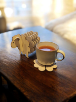 Schaap met onderzetters